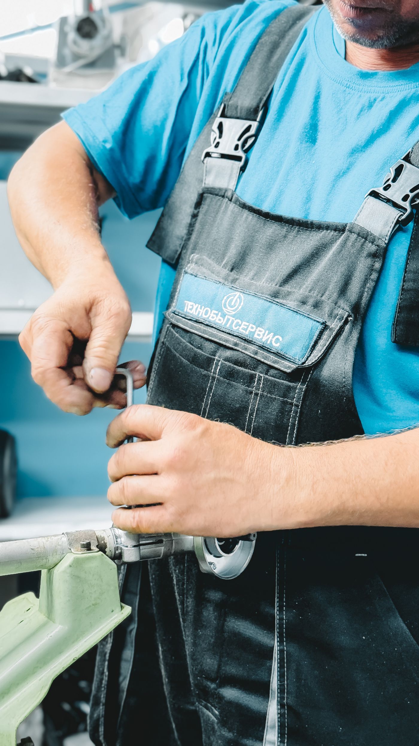 Plumber working on a household pipe connection